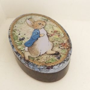 Beatrix Potter Peter Rabbit hollend konijntje blikje